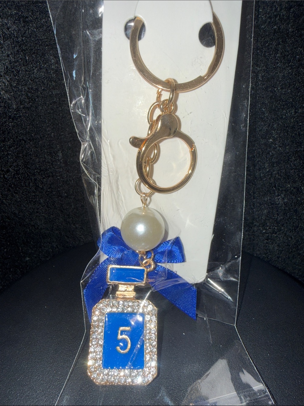 Gold-Tone Blue '5' Perfume Bottle Keychain with Pearl and Bow